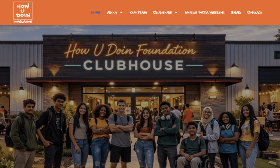 Group of diverse young students smiling in front of a building with'How U Doin Foundation Clubhouse' sign above.