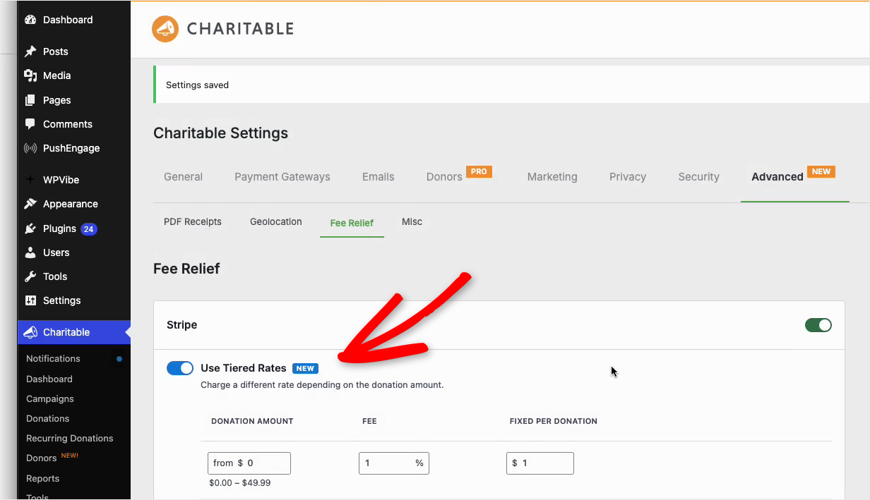 01-fee-relief-tiered-rates-settings | Charitable L'écran des paramètres de Fee Relief dans Charitable avec le commutateur Utiliser les taux par paliers activé pour Stripe et la première tranche de don renseignée
